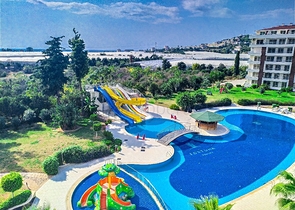 ضمن منتجع صيفي مناسب للعطلات - شقة 2 غرفة وصالة - ديمرتاش / الانيا 