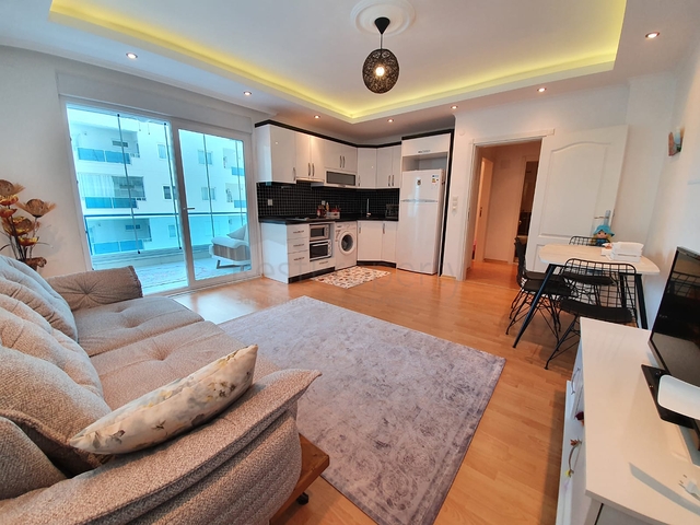 شقة غرفة وصالة - مفروشة -ضمن مجمع سكني - في مهموتلار / الانيا 