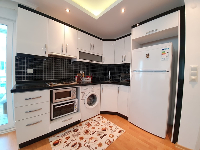 شقة غرفة وصالة - مفروشة -ضمن مجمع سكني - في مهموتلار / الانيا 