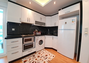 شقة غرفة وصالة - مفروشة -ضمن مجمع سكني - في مهموتلار / الانيا 