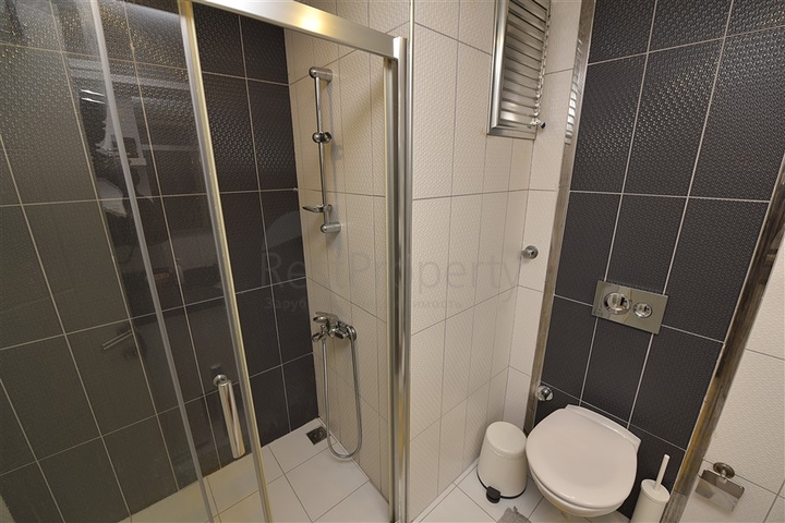 شقة تصميم غرفتين وصالة - مع الاثاث - ضمن مجمع حديث - في افسلار / الانيا 