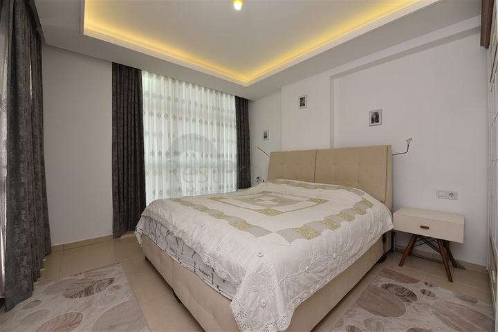 شقة تصميم غرفتين وصالة - مع الاثاث - ضمن مجمع حديث - في افسلار / الانيا 