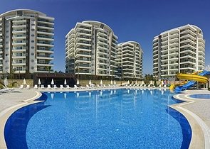 شقة تصميم غرفتين وصالة - مع الاثاث - ضمن مجمع حديث - في افسلار / الانيا 