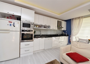 شقة تصميم غرفتين وصالة - مع الاثاث - ضمن مجمع حديث - في افسلار / الانيا 