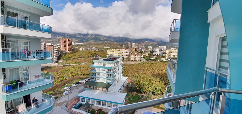 سعر منافس - شقة مؤثثة -طابق مرتفع - ضمن مجمع سكني في مهموتلار / الانيا 