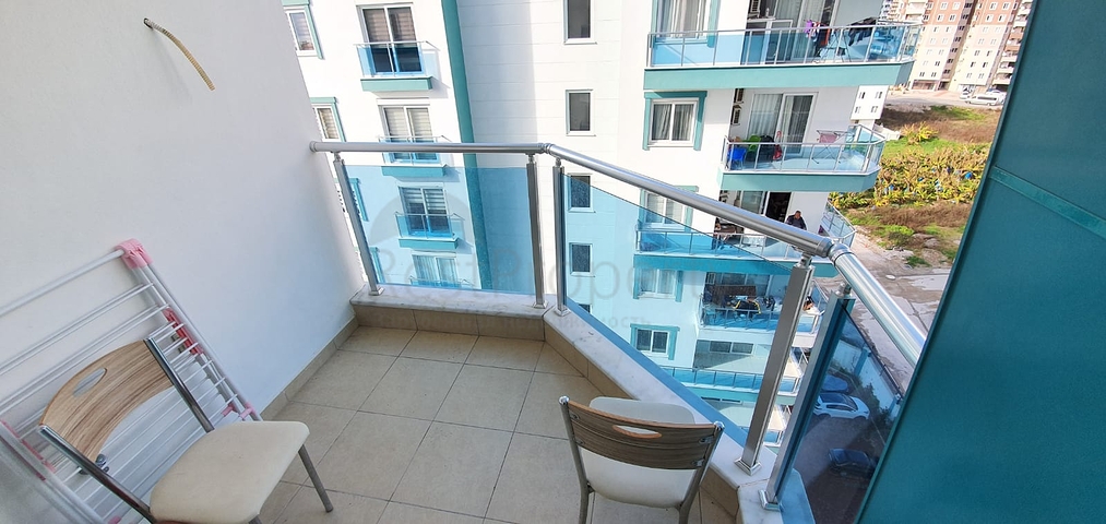 سعر منافس - شقة مؤثثة -طابق مرتفع - ضمن مجمع سكني في مهموتلار / الانيا 