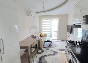 سعر منافس - شقة مؤثثة -طابق مرتفع - ضمن مجمع سكني في مهموتلار / الانيا 