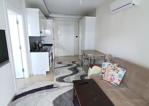 سعر منافس - شقة مؤثثة -طابق مرتفع - ضمن مجمع سكني في مهموتلار / الانيا 