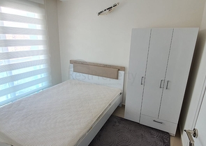 سعر منافس - شقة مؤثثة -طابق مرتفع - ضمن مجمع سكني في مهموتلار / الانيا 