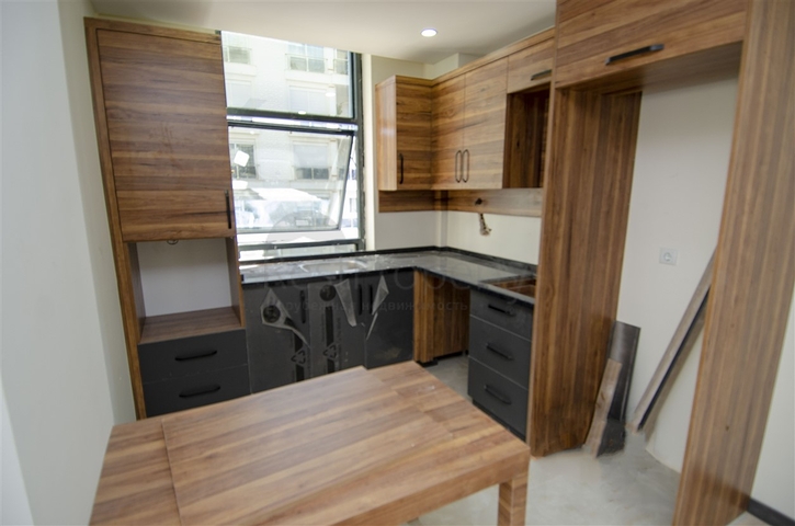 شقق 1 + 1 و 2 + 1 في منزل جديد في هورم كونيالتي أنطاليا