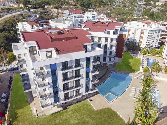 شقق 1 + 1 و 2 + 1 في منزل جديد في هورم كونيالتي أنطاليا