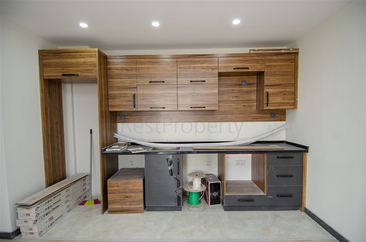 شقق 1 + 1 و 2 + 1 في منزل جديد في هورم كونيالتي أنطاليا