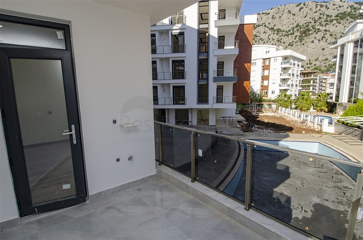 شقق 1 + 1 و 2 + 1 في منزل جديد في هورم كونيالتي أنطاليا