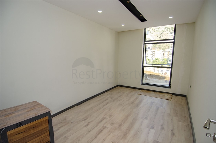 شقق 1 + 1 و 2 + 1 في منزل جديد في هورم كونيالتي أنطاليا