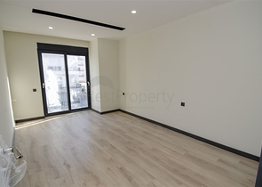 شقق 1 + 1 و 2 + 1 في منزل جديد في هورم كونيالتي أنطاليا