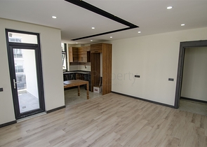 شقق 1 + 1 و 2 + 1 في منزل جديد في هورم كونيالتي أنطاليا