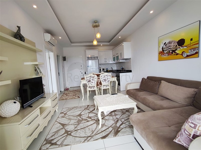 شقة غرفة وصالة - مفروشة - ضمن مجمع سكني - في مهموتلار / الانيا 