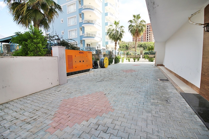 شقة غرفة وصالة - مفروشة - ضمن مجمع سكني - في مهموتلار / الانيا 