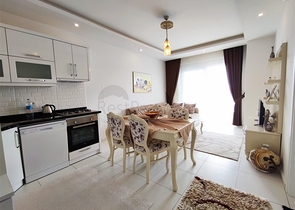 شقة غرفة وصالة - مفروشة - ضمن مجمع سكني - في مهموتلار / الانيا 