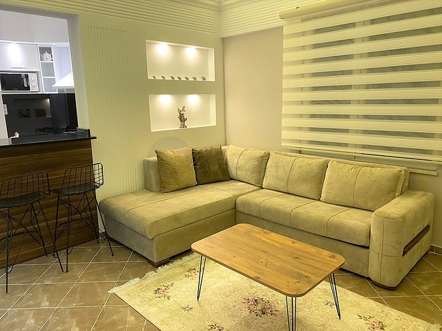 شقة غرفة وصالة - اكساء واثاث جديد - في منطقة حيوية - اوبا / الانيا 