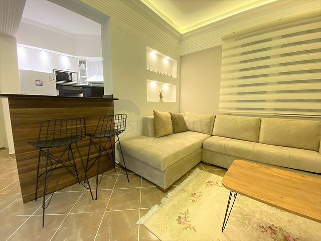 شقة غرفة وصالة - اكساء واثاث جديد - في منطقة حيوية - اوبا / الانيا 