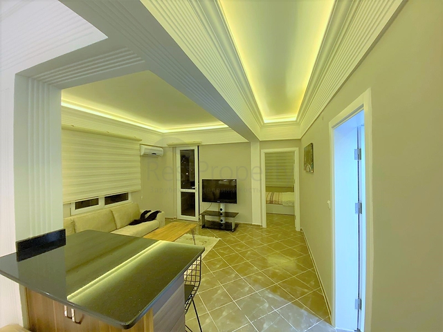 شقة غرفة وصالة - اكساء واثاث جديد - في منطقة حيوية - اوبا / الانيا 