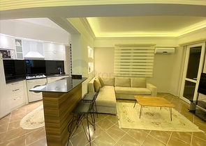 شقة غرفة وصالة - اكساء واثاث جديد - في منطقة حيوية - اوبا / الانيا 