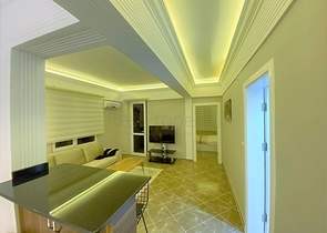 شقة غرفة وصالة - اكساء واثاث جديد - في منطقة حيوية - اوبا / الانيا 