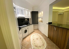 شقة غرفة وصالة - اكساء واثاث جديد - في منطقة حيوية - اوبا / الانيا 