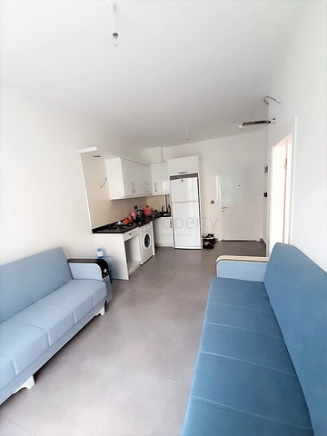 مجمع حديث يضم كافة الخدمات - شقة غرفة وصالة - في مهوتلار / الانيا 