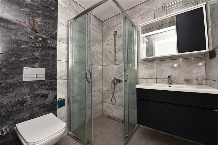 مجمع حديث يضم كافة الخدمات - شقة غرفة وصالة - في مهوتلار / الانيا 