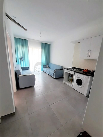 مجمع حديث يضم كافة الخدمات - شقة غرفة وصالة - في مهوتلار / الانيا 