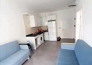 مجمع حديث يضم كافة الخدمات - شقة غرفة وصالة - في مهوتلار / الانيا 