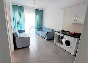 مجمع حديث يضم كافة الخدمات - شقة غرفة وصالة - في مهوتلار / الانيا 