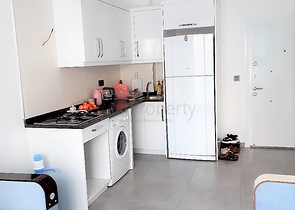 مجمع حديث يضم كافة الخدمات - شقة غرفة وصالة - في مهوتلار / الانيا 