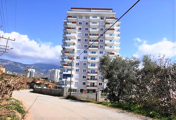 شقة 2 غرفة وصالة  - ضمن مجمع يضم كافة الخدمات - مهموتلار / الانيا 