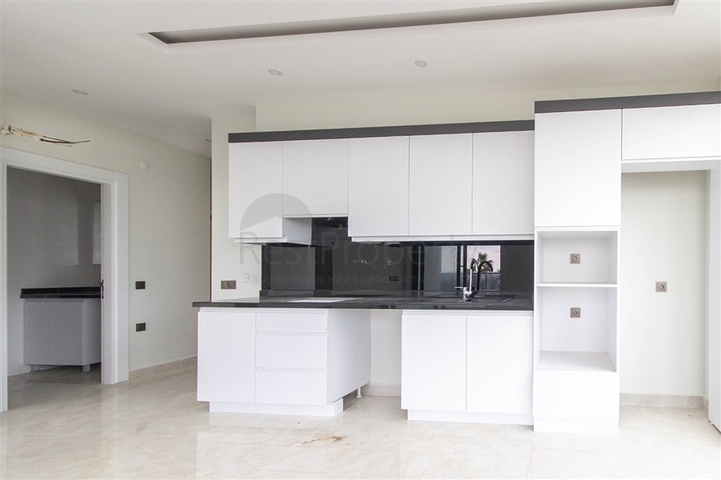 اطلالة بحر مباشرة - شقة غرفتين وصالة - ضمن مجمع 5 نجوم - مهموتلار / الانيا 