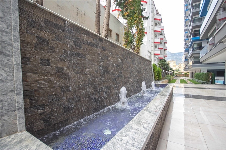 اطلالة بحر مباشرة - شقة غرفة وصالة  مؤثثة - ضمن مجمع 5 نجوم -  مهموتلار / الانيا 