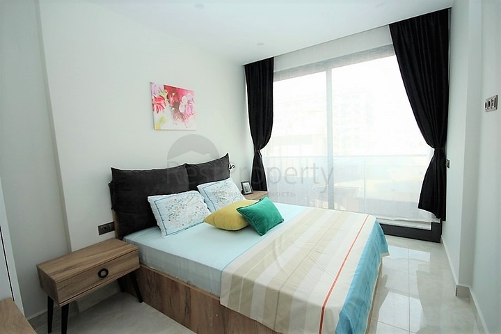 اطلالة بحر مباشرة - شقة غرفة وصالة  مؤثثة - ضمن مجمع 5 نجوم -  مهموتلار / الانيا 