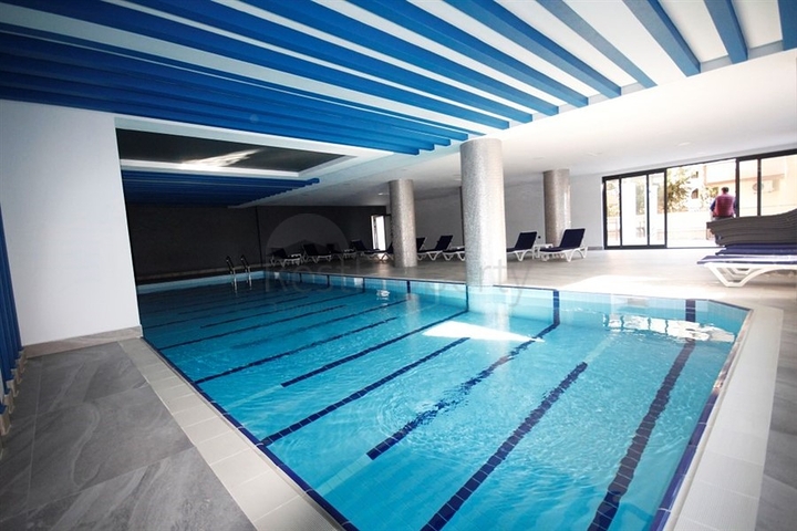 اطلالة بحر مباشرة - شقة غرفة وصالة  مؤثثة - ضمن مجمع 5 نجوم -  مهموتلار / الانيا 