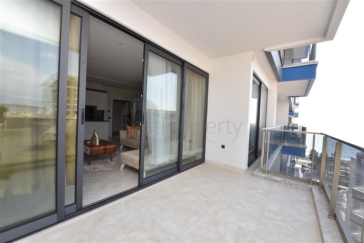 اطلالة بحر مباشرة - شقة غرفة وصالة  مؤثثة - ضمن مجمع 5 نجوم -  مهموتلار / الانيا 