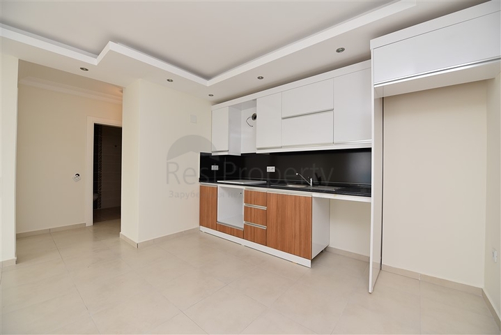 شقة غرفة وصالة - ضمن مجمع يضم كافة الخدمات - مهموتلار / الانيا 