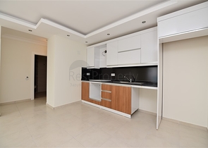 شقة غرفة وصالة - ضمن مجمع يضم كافة الخدمات - مهموتلار / الانيا 