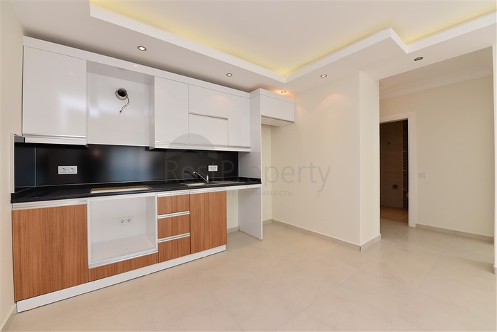 شقة غرفة وصالة - ضمن مجمع سكني متكامل - في مهموتلار / الانيا 