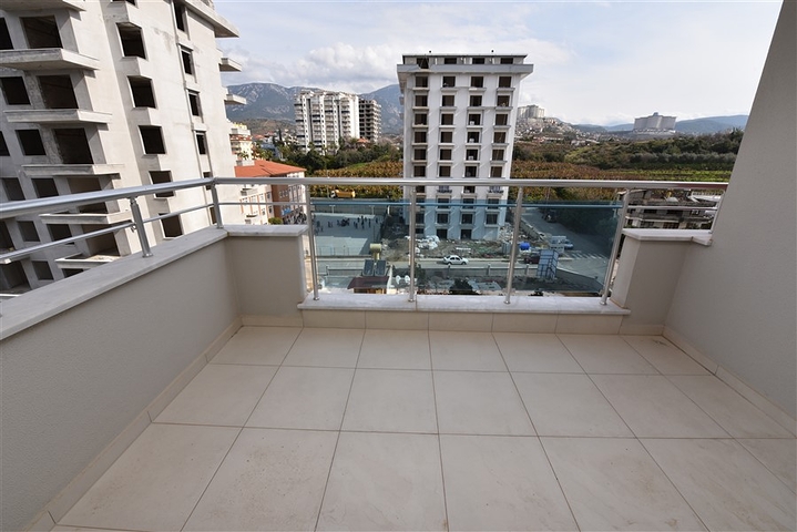 شقة 2 غرفة وصالة - مفروشة -ضمن مجمع سكني - مهموتلار / الانيا 