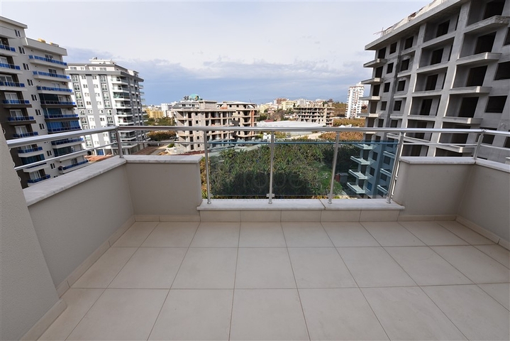 شقة 2 غرفة وصالة - مفروشة -ضمن مجمع سكني - مهموتلار / الانيا 