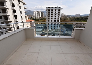 شقة 2 غرفة وصالة - مفروشة -ضمن مجمع سكني - مهموتلار / الانيا 