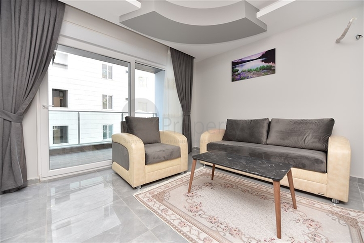 شقق غرفة وصالة مفروشة - ضمن مجمع حديث في الانيا / مهموتلار 