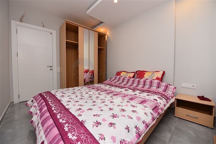 شقق غرفة وصالة مفروشة - ضمن مجمع حديث في الانيا / مهموتلار 