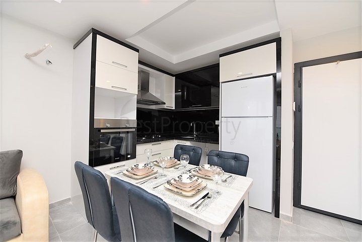 شقق غرفة وصالة مفروشة - ضمن مجمع حديث في الانيا / مهموتلار 